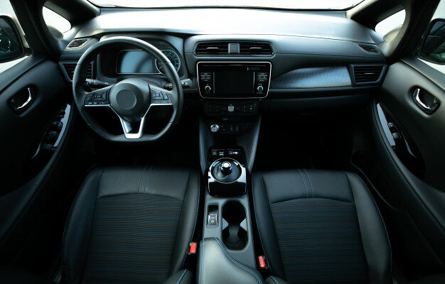 electric-car-interior-details-door-handle-with-windows-controls-adjustments-inside-car-interior-with-front-seats-driver-passenger-textile-windows-door-panels-console_153228-742